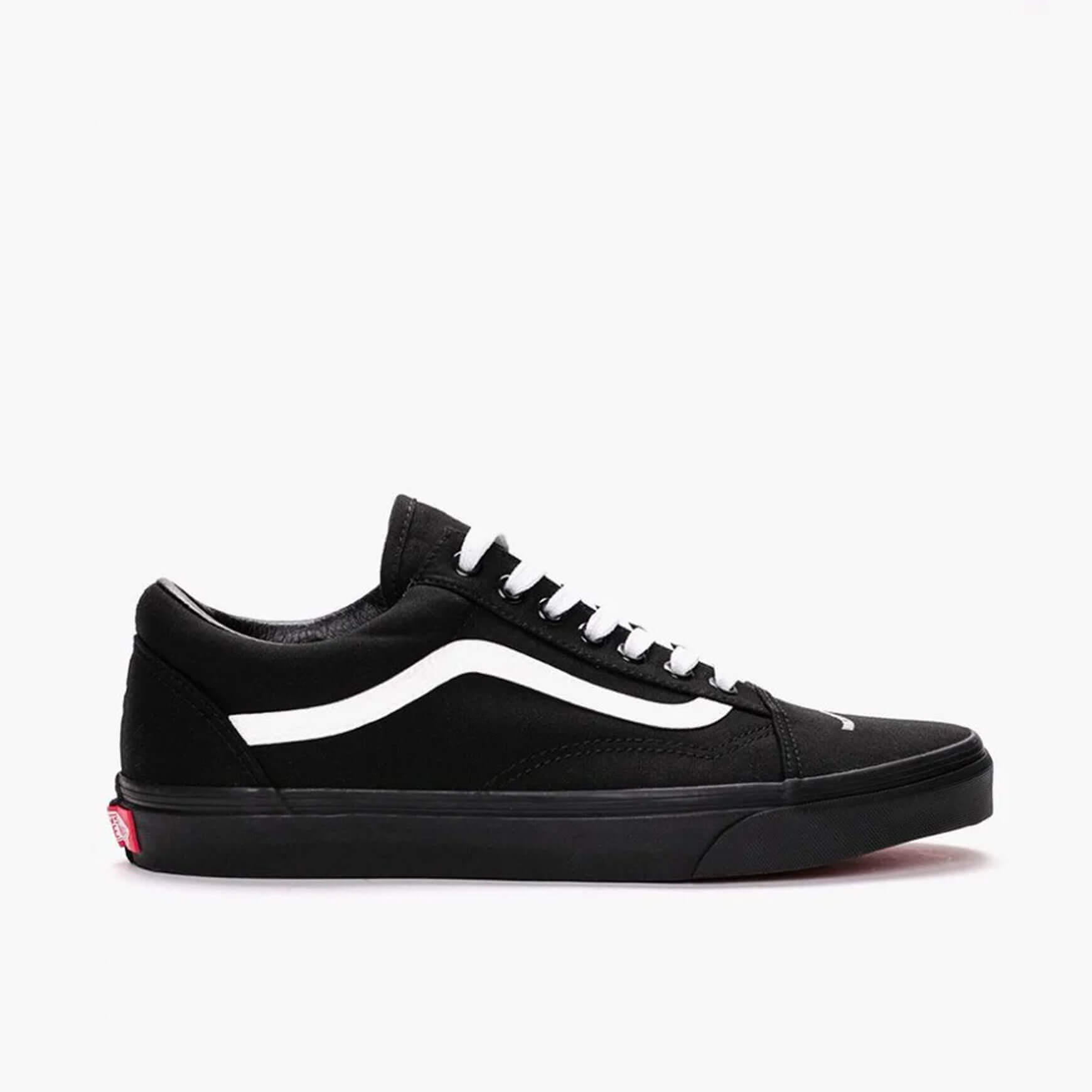 All black vans with white stripe best sale