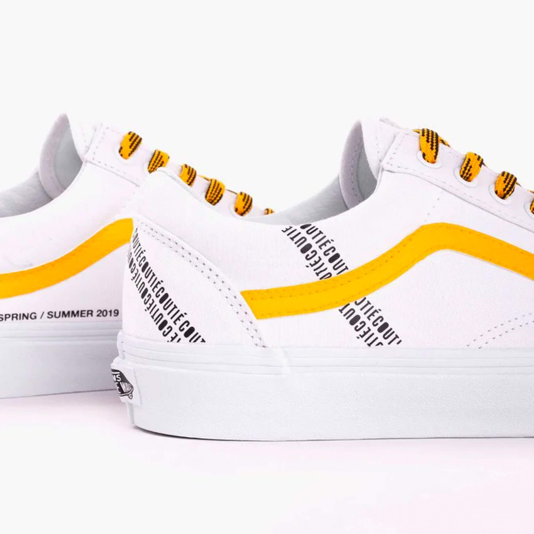 White vans 2025 with yellow stripe